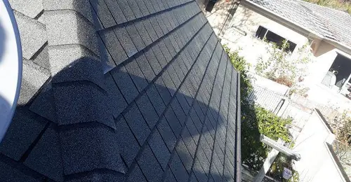 Architectural asphalt shingle roofing close-up