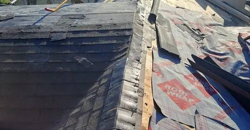 Shingle roof repair in progress on a New Zealand home