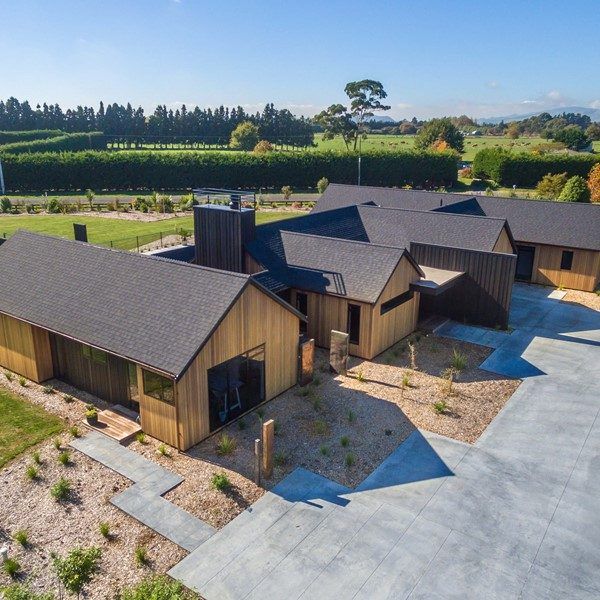 Aerial view of an architectural asphalt shingle roof on an Auckland home