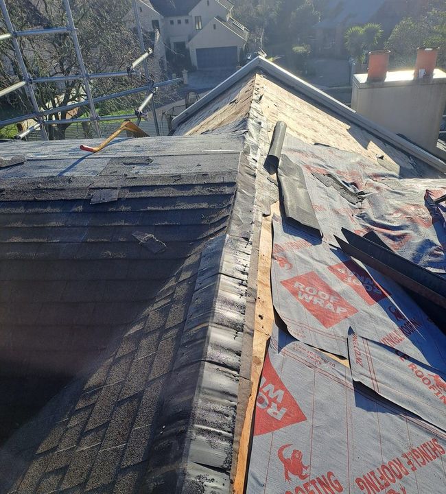 Shingle roof repair in progress on an Auckland home